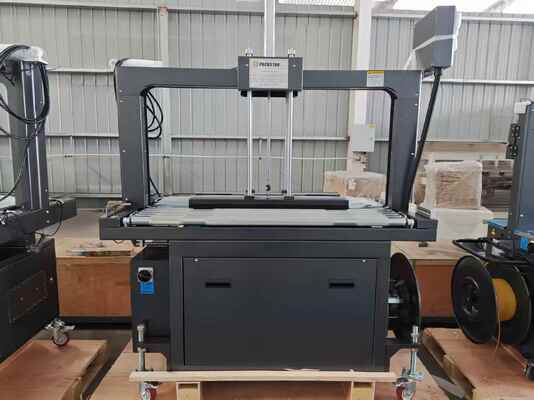 गुणवत्ता  Semi-Automatic 1200mm Carton Box Strapping Machine with One Year Warranty for Efficient Packing कारखाना